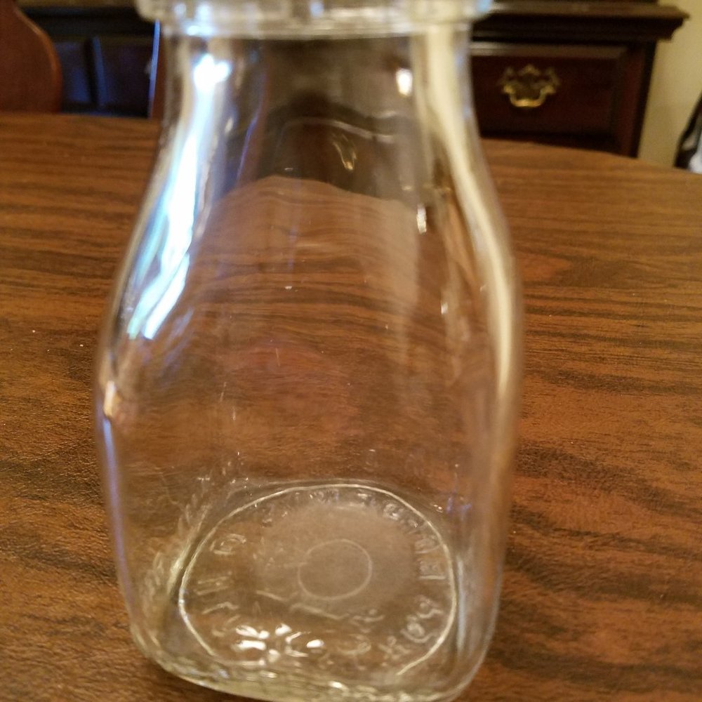 Vintage Embossed Borden's 1/2 pint milk bottle